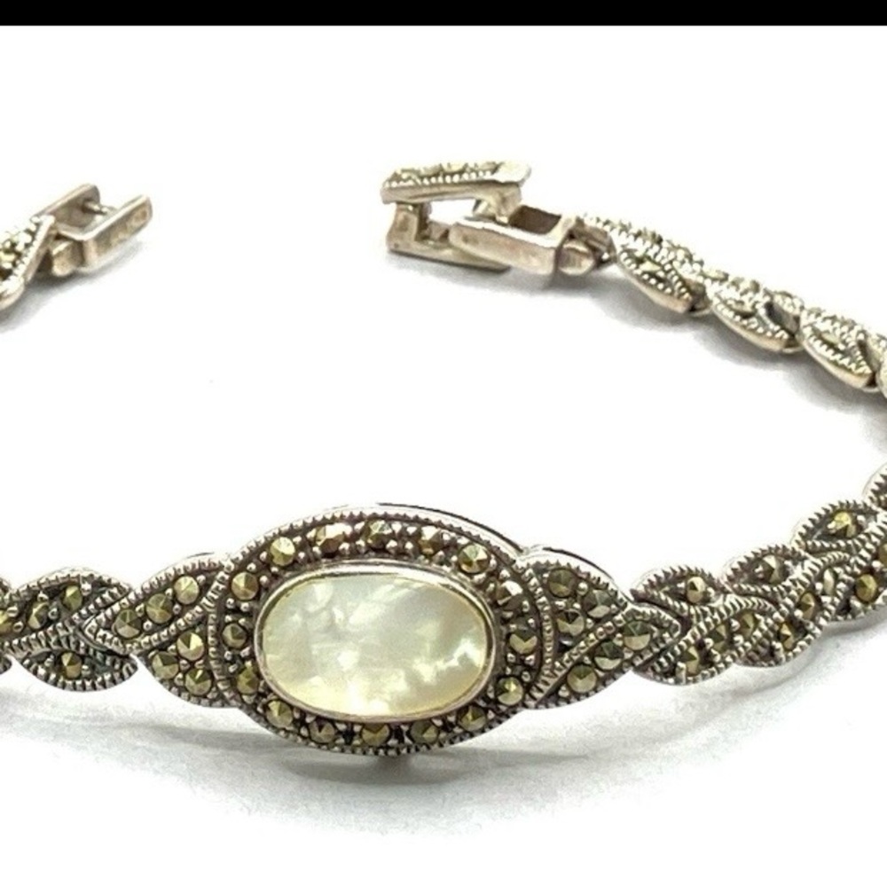 Vintage Marcasite link bracelet
Oval Mother of Pearl
